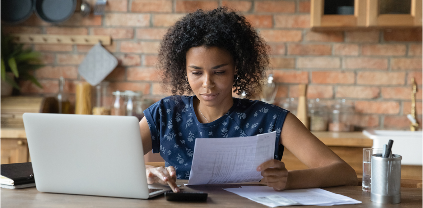 a woman paying her credit card bill